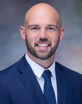 Picture of basic science first prize winner Dr. Tyler Williamson.